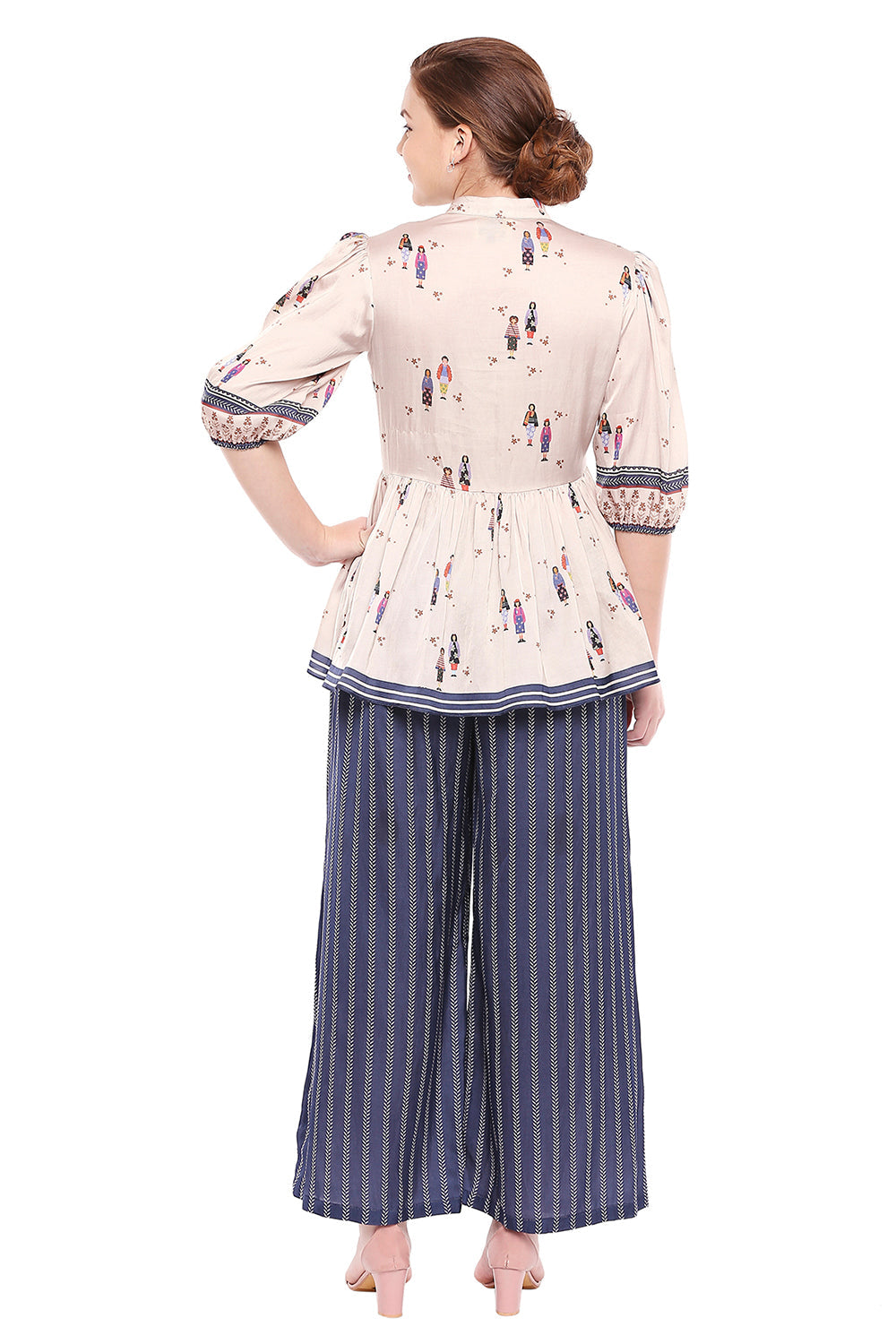 People Printed Top With Buttons Paired With Printed Palazzo Pants